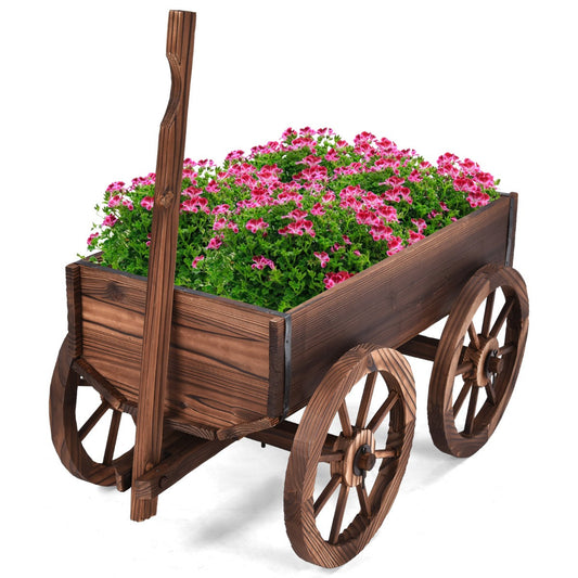 Rustic wooden flower cart with four large wheels creates charming indoor or outdoor decoration
