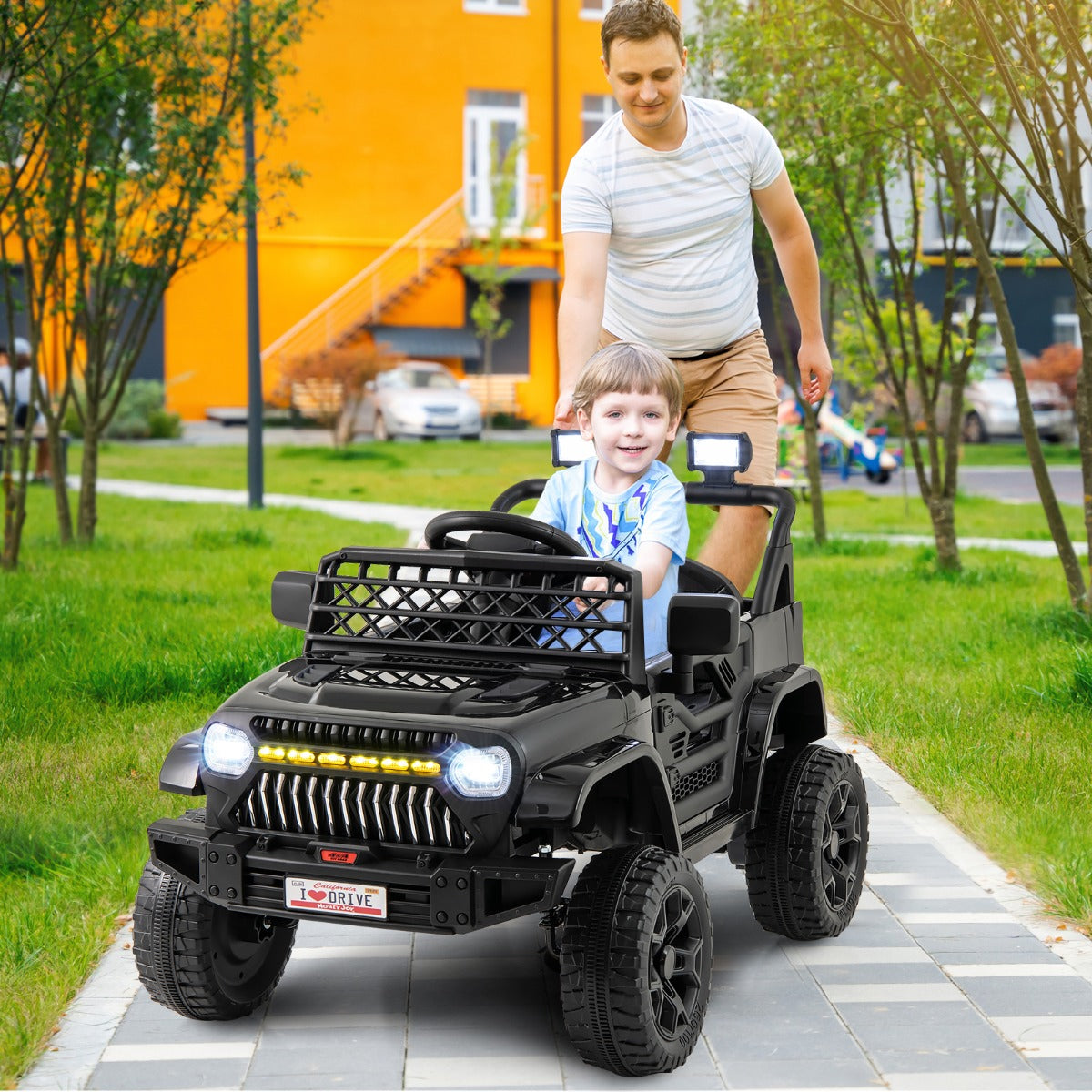 Kids electric truck with four thickened shock-absorbing tires for smooth driving on multiple surfaces