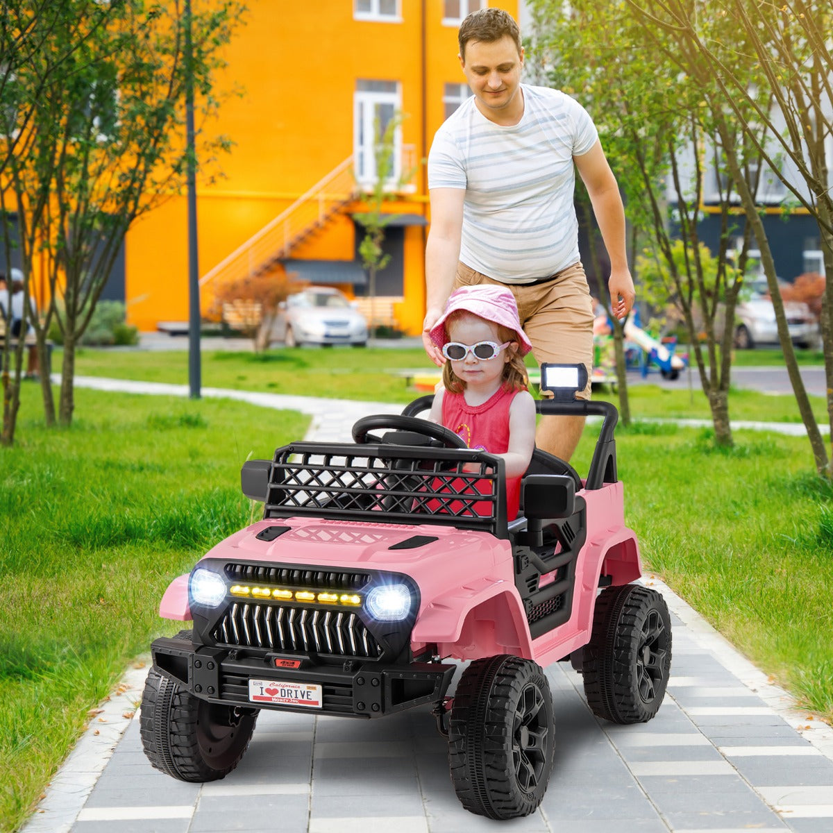 Kids electric truck with four thickened shock-absorbing tires for smooth driving on multiple surfaces