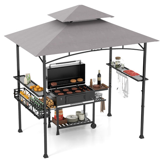 Grey and black grilling shelter includes two side shelves for preparing food and holding utensils