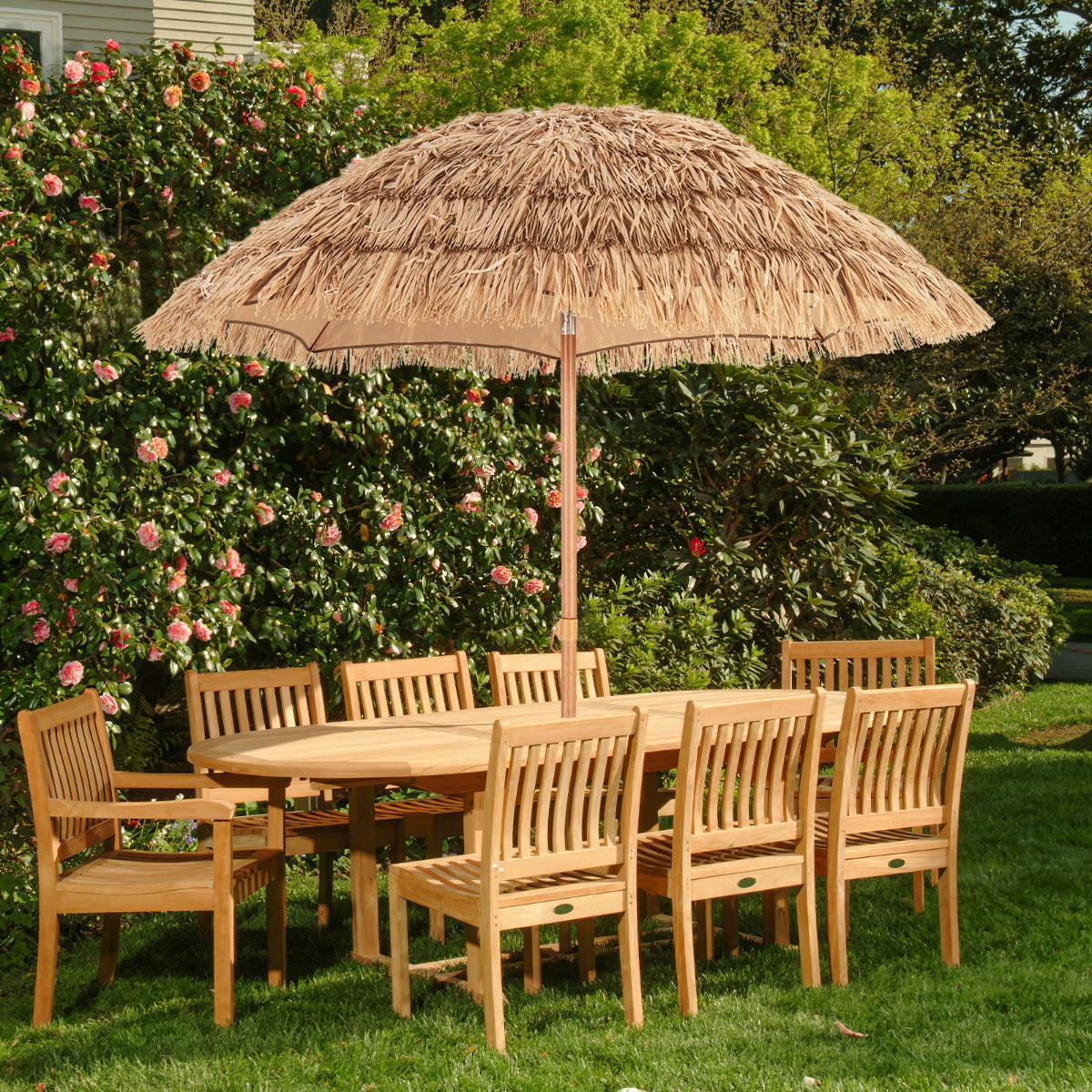 Portable thatched umbrella folds into the included carrying bag for convenient transport and storage
