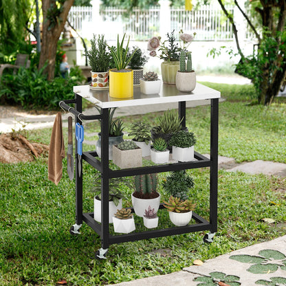 Two lockable casters hold the barbecue trolley securely in place during food preparation