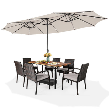 Auto-charging solar panel powers four lights on each of the umbrella's twelve metal ribs