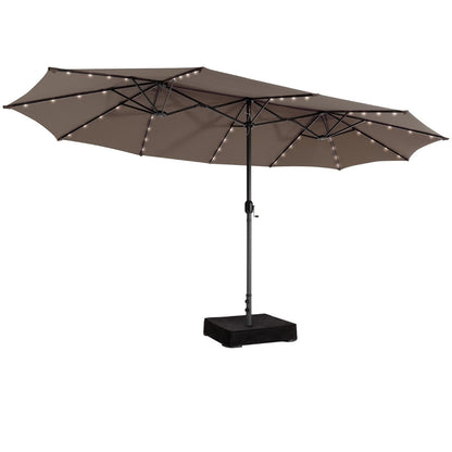 Extra-wide twin market umbrella offers spacious shade for outdoor dining, gardens, and commercial areas