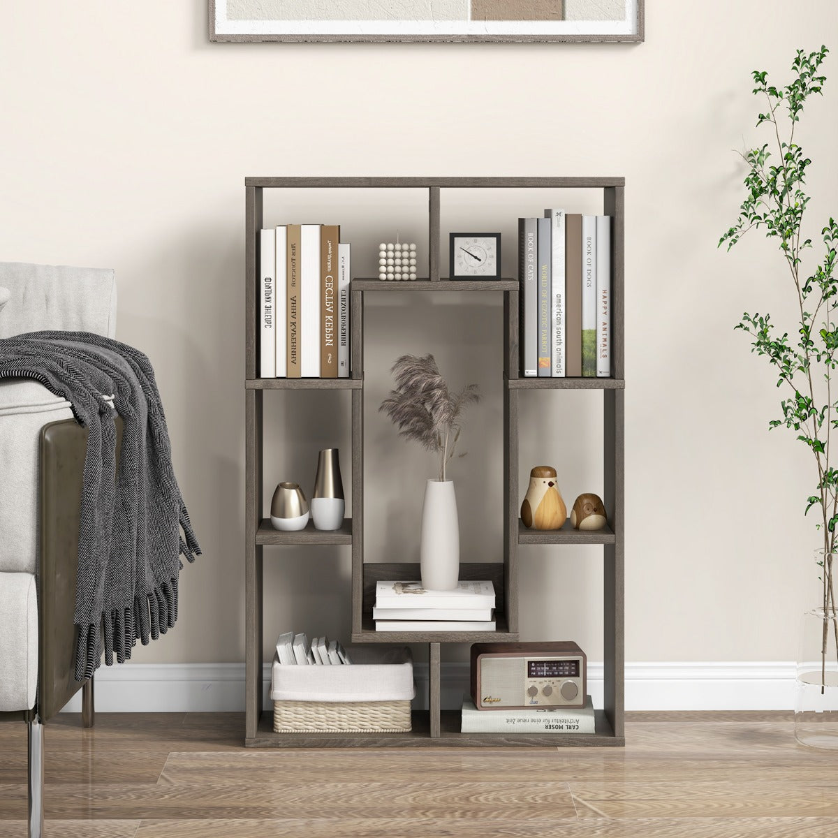 Varying shelf sizes provide flexible organization for decorations, books, storage boxes, and accessories