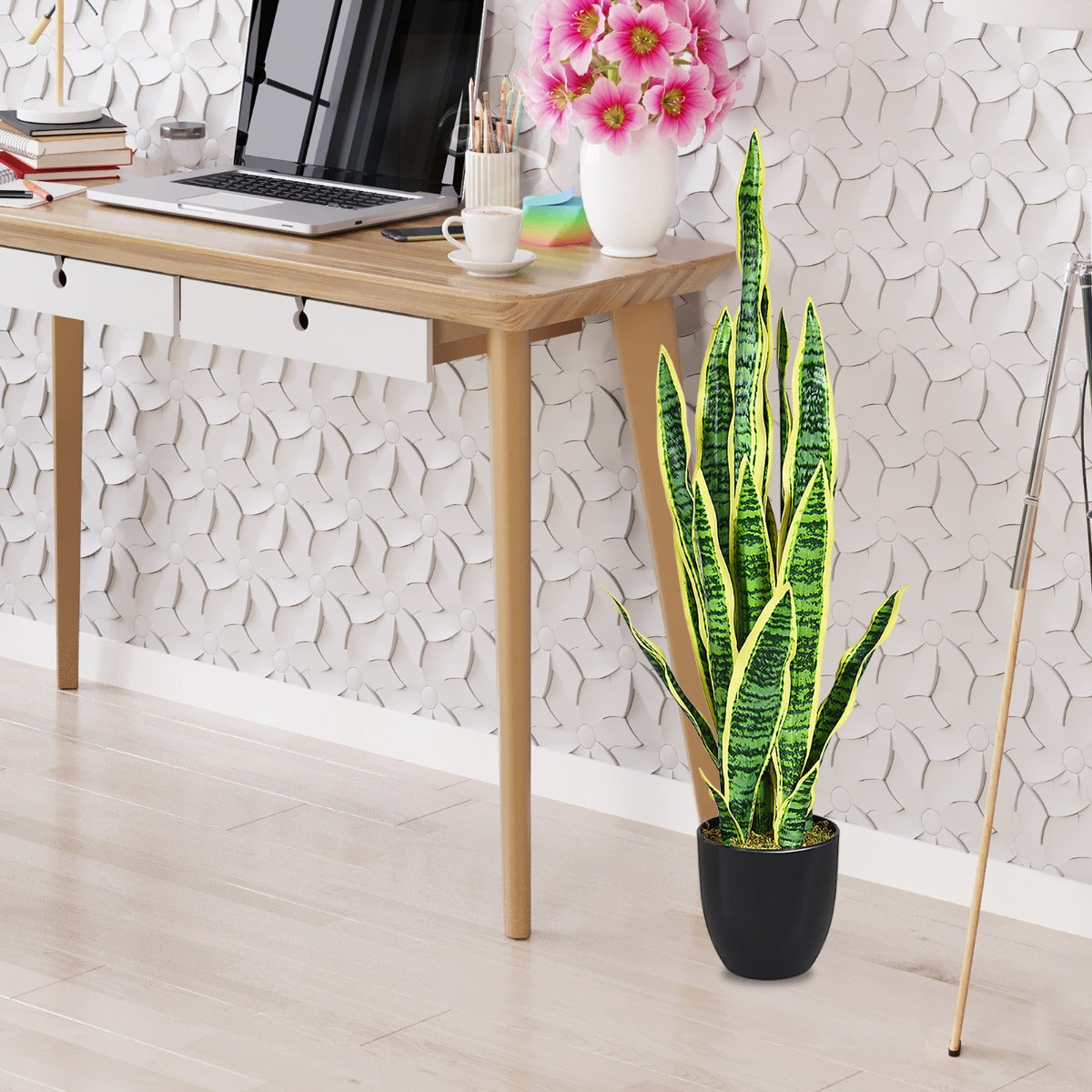 Preassembled artificial floor plant adds fresh greenery to home, hotel, or office decor