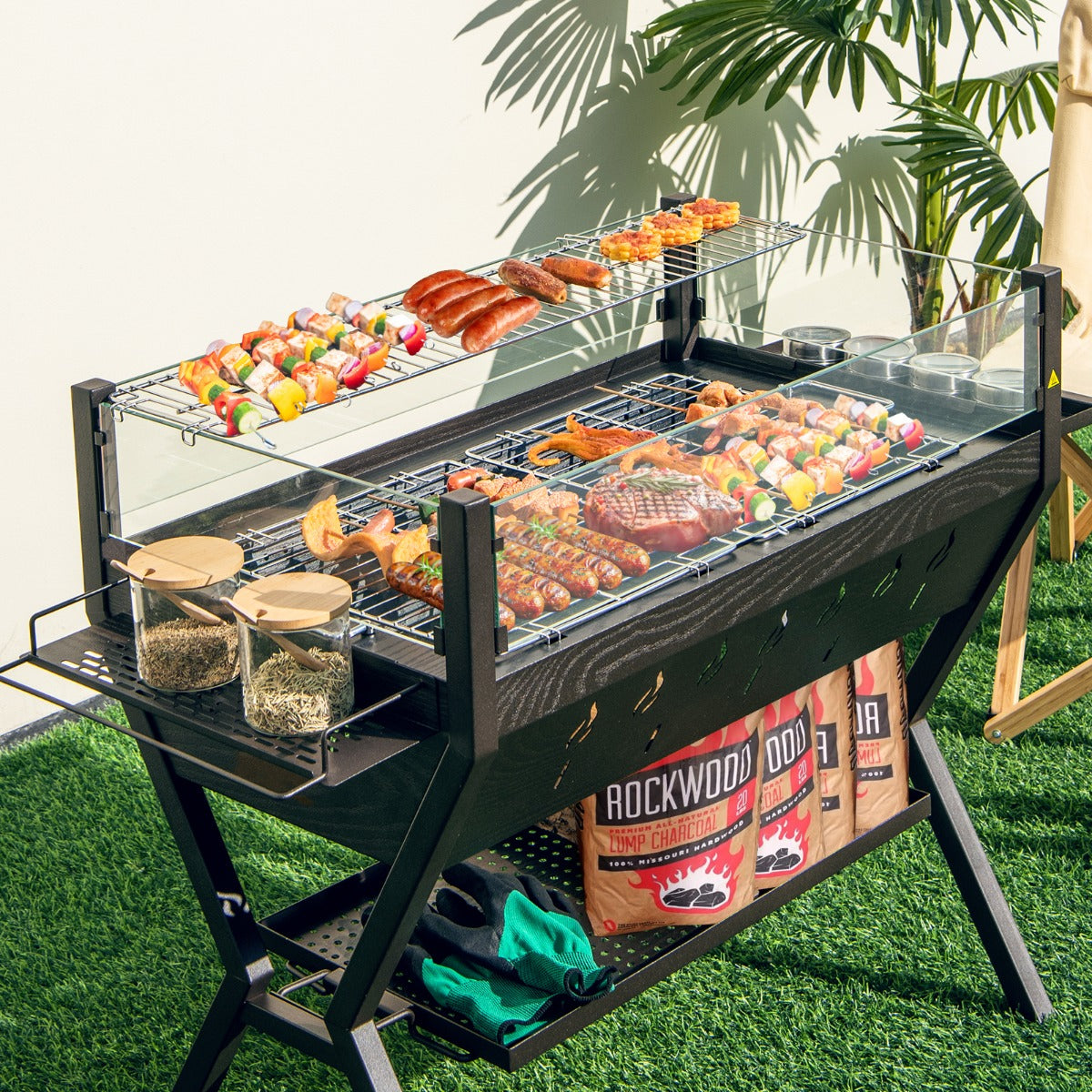 Portable charcoal BBQ grill with efficient ventilation holes for faster, more even cooking results