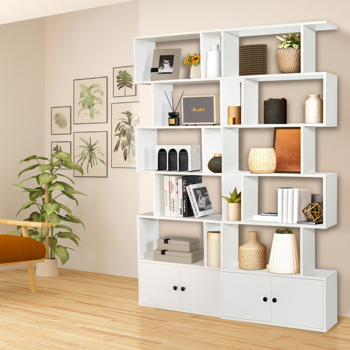 Four anti-toppling devices help secure this tall freestanding bookshelf firmly to the wall