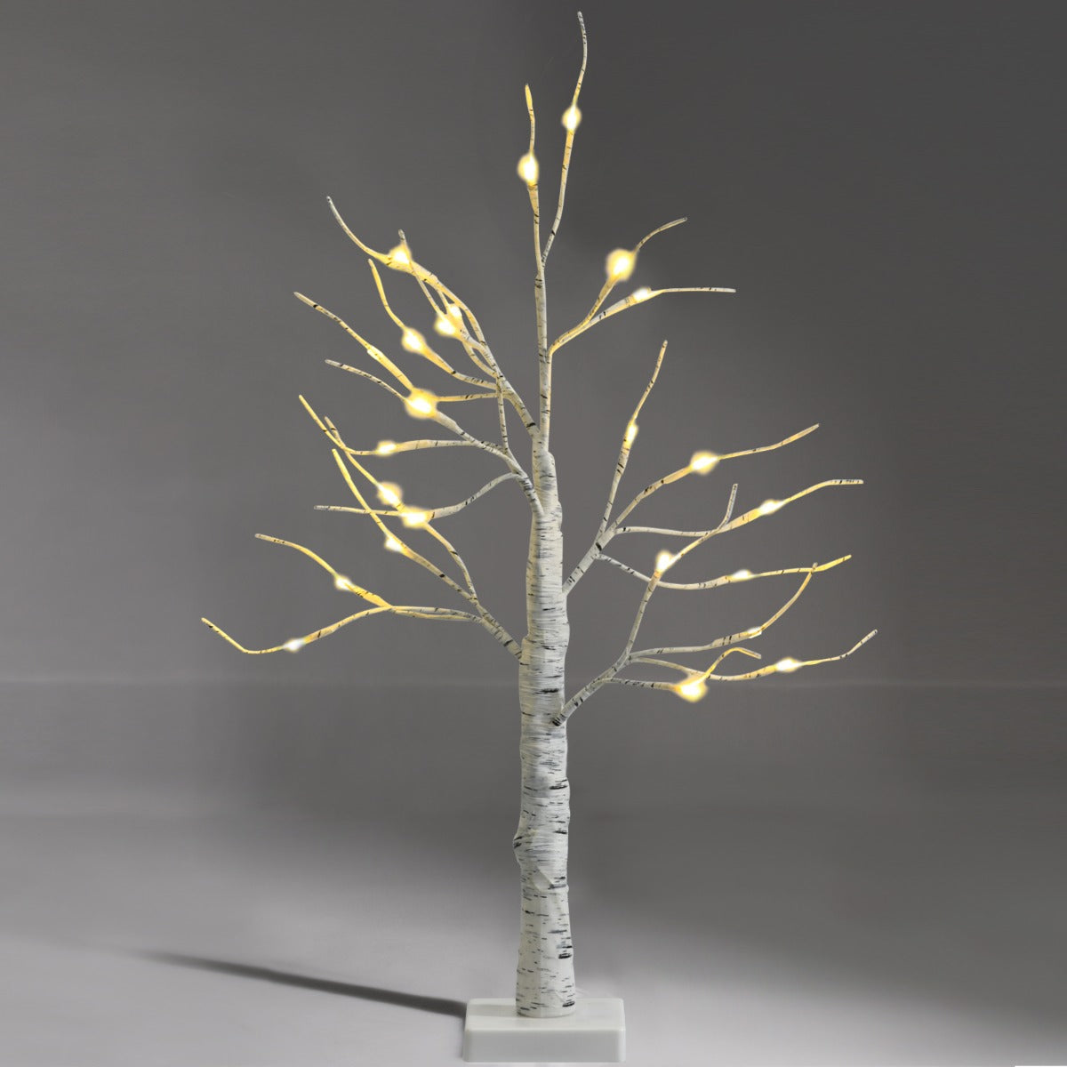 Metal and plastic base provides stable support for this elegant holiday room decoration