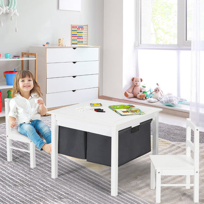 Two large non-woven fabric drawers store blocks, books, art supplies and toys beneath the activity table