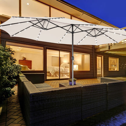 Cross-base twin umbrella includes two fillable sandbags holding up to 160 kg for strong wind resistance