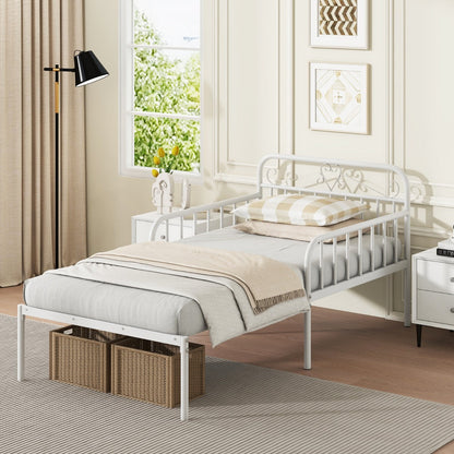 Decorative metal guardrails add elegant scrollwork and stylish detail to this versatile daybed