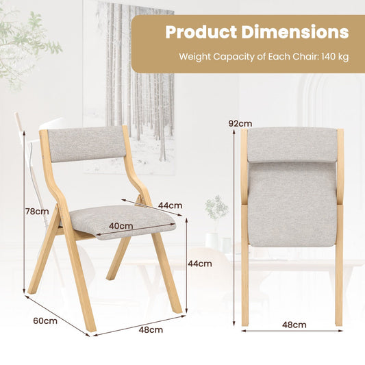 Set of two folding dining chairs with solid bent wood frames and elegant modern styling