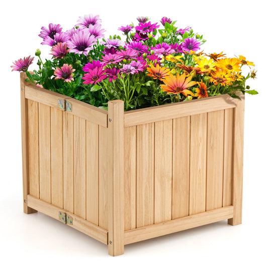 Portable wooden planter box with elevated legs and a bottom drainage hole for healthier plants