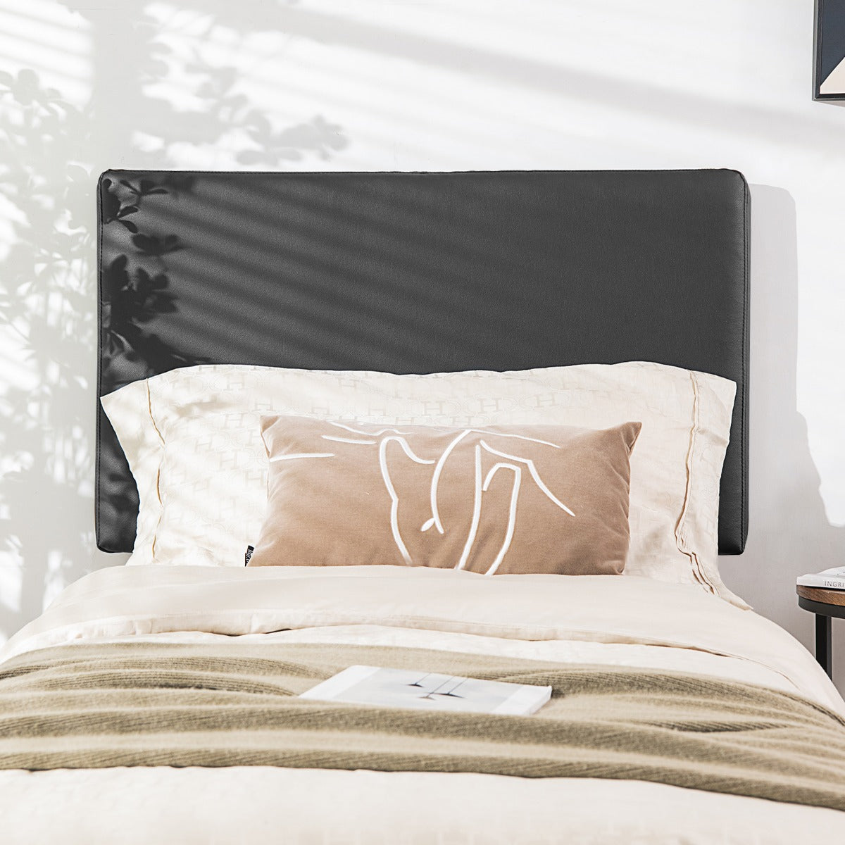 Versatile headboard compatible with multiple bed sizes and a variety of bedroom furniture styles