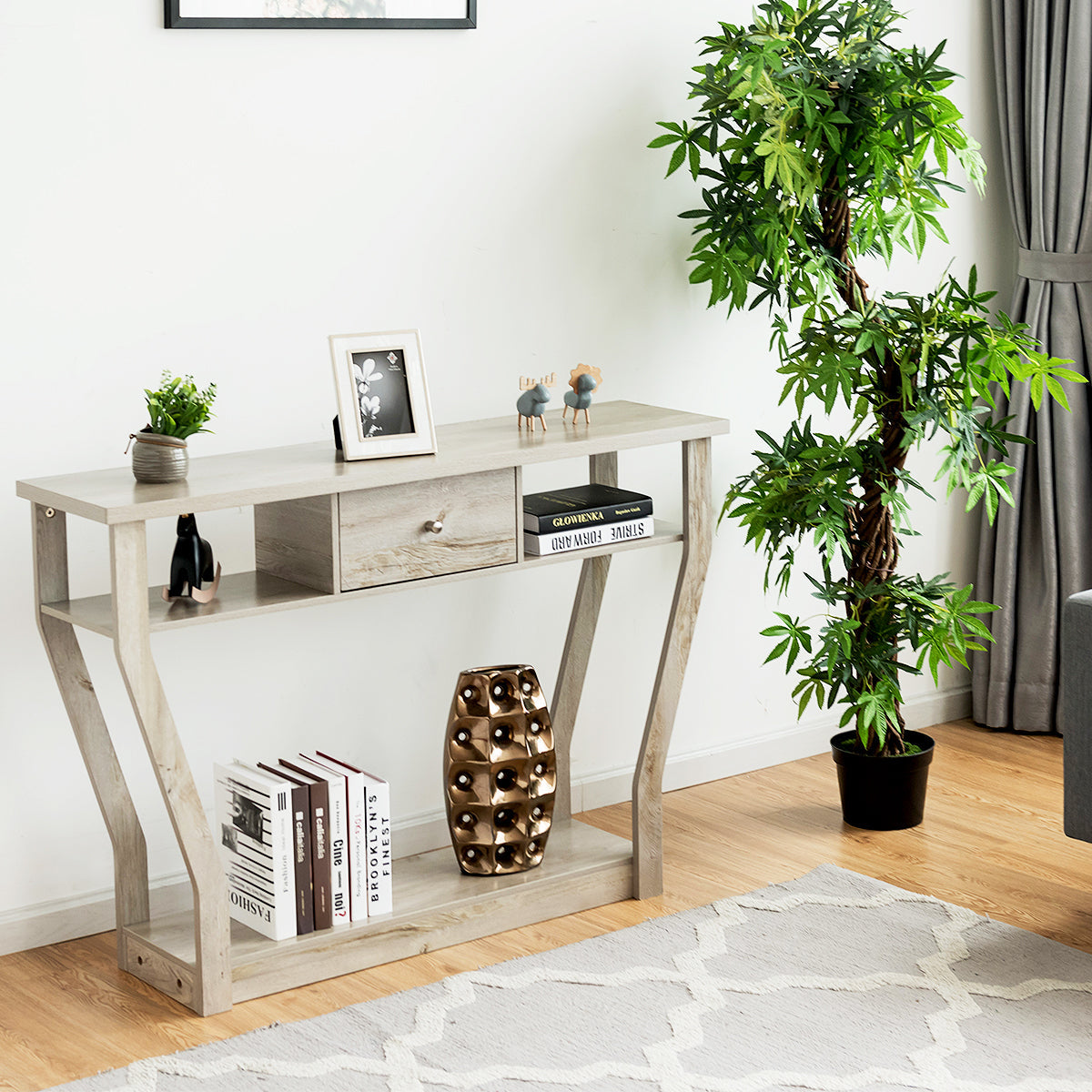 Black and brown console table with curved legs for a contemporary yet classical home style
