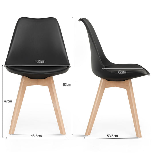 Set of four modern dining chairs with curved backrests and soft upholstered seat cushions