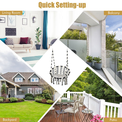 Black and white hanging hammock chair offers a relaxing seat for reading, sunbathing, or watching TV