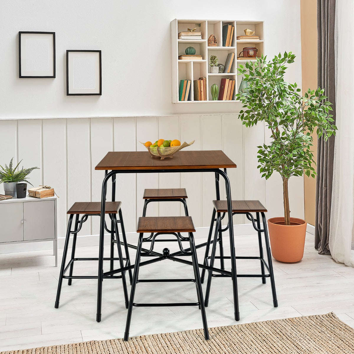 Compact stools slide beneath the table for convenient storage in kitchens and dining areas