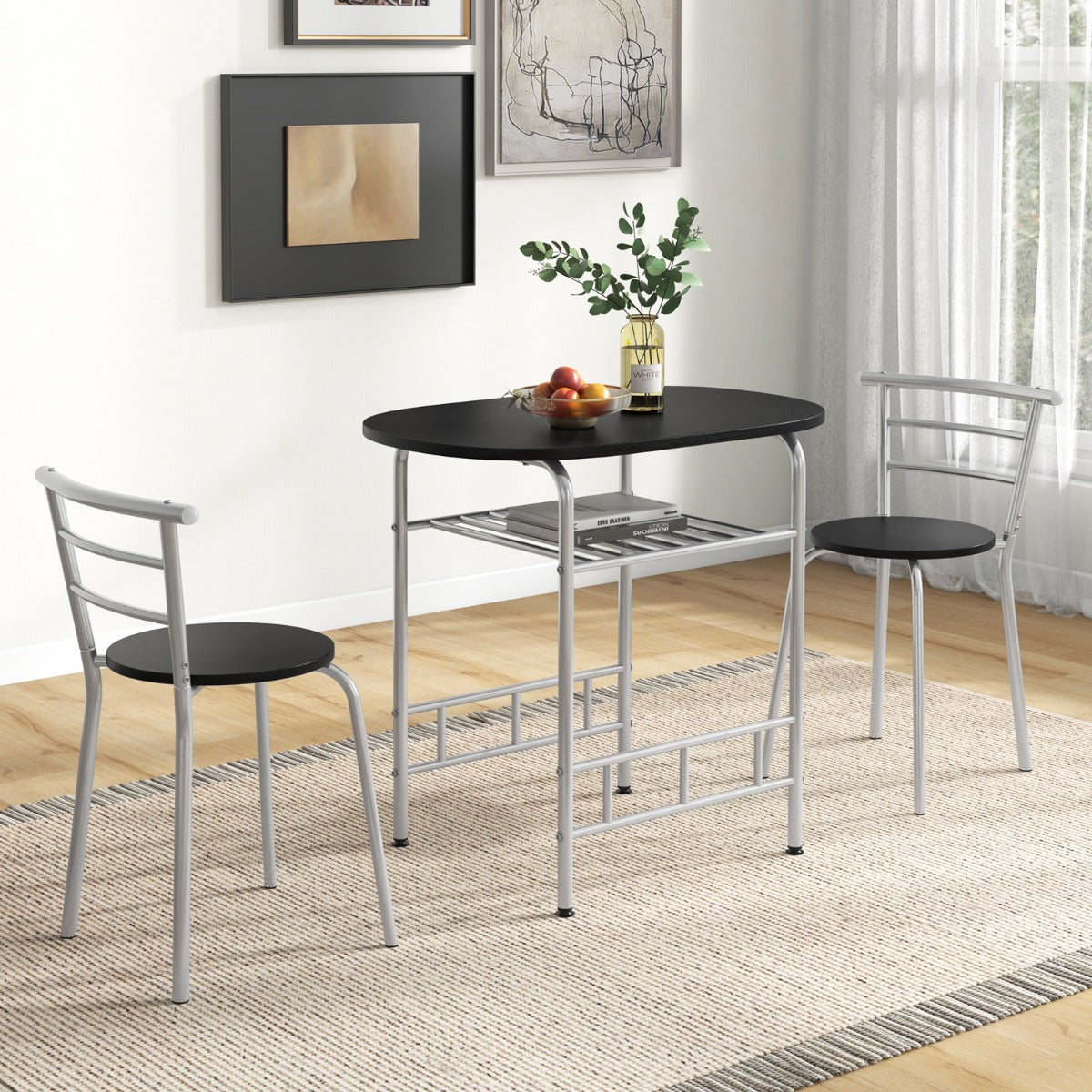 Space-saving dining table set allows both chairs to tuck underneath the table when not in use