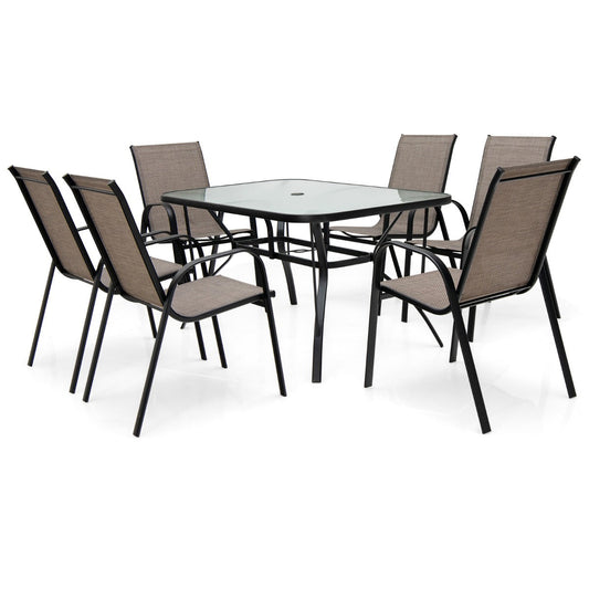 Brown patio furniture set includes one rectangular table and six stackable chairs for outdoor dining