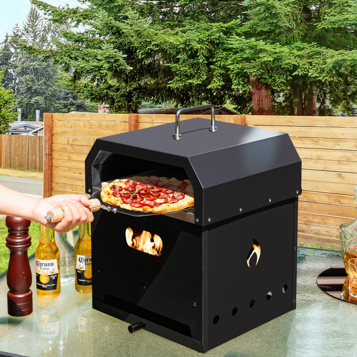 Heavy-duty iron and stainless steel pizza oven resists rust, deformation and temperatures up to 300 degrees