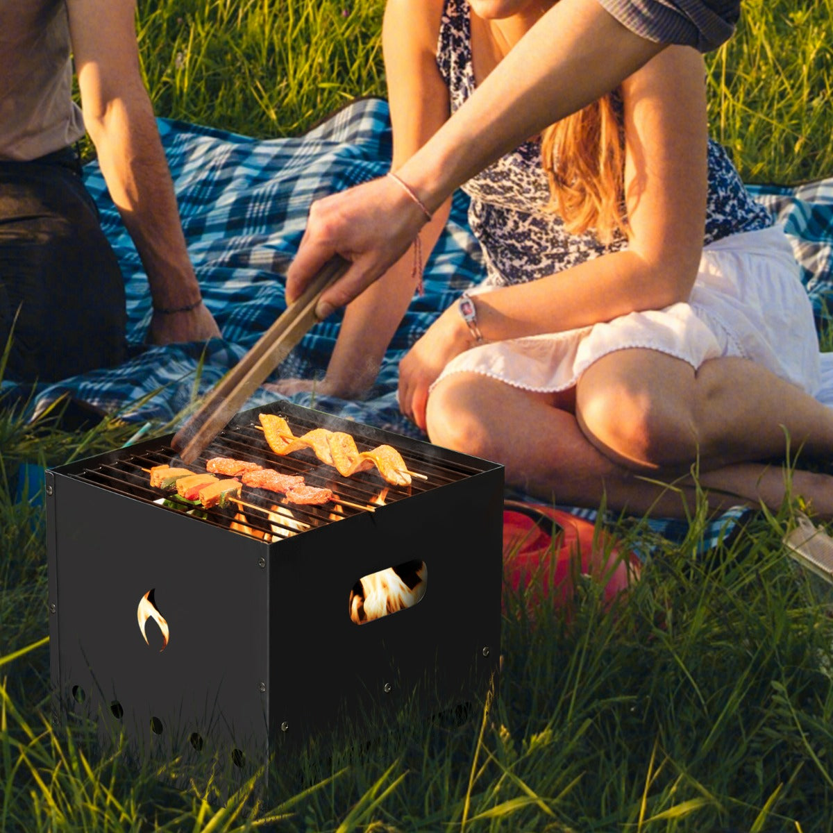 Lightweight pizza grill oven has carrying handles for convenient transport to campsites and gatherings