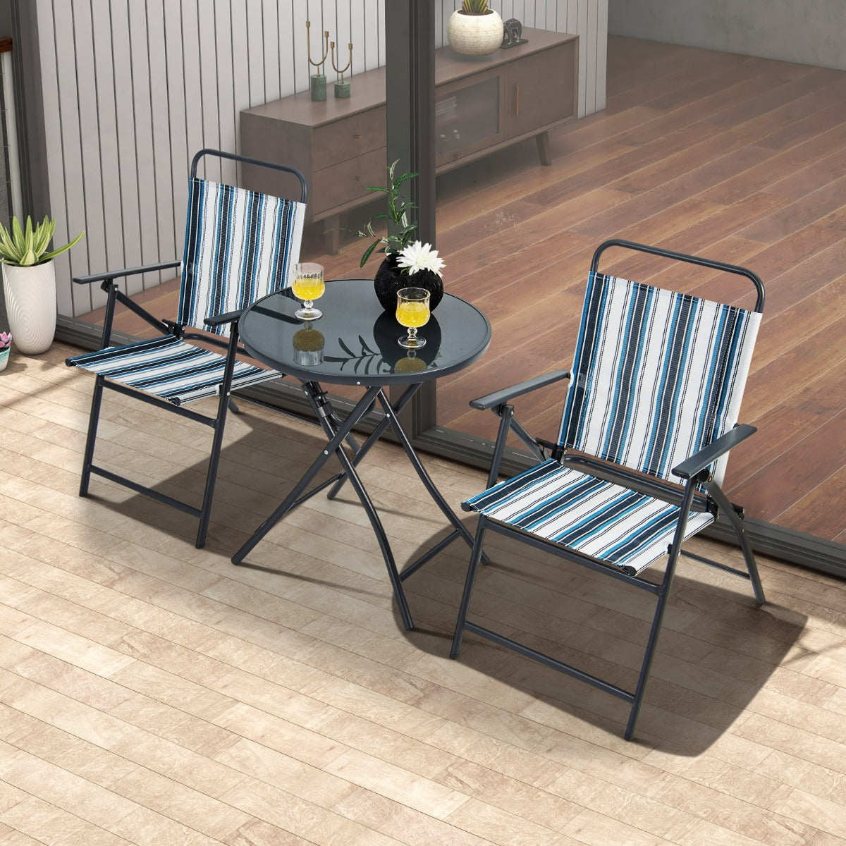 Foldable patio table and chairs collapse into compact sizes for easy carrying and space-saving storage