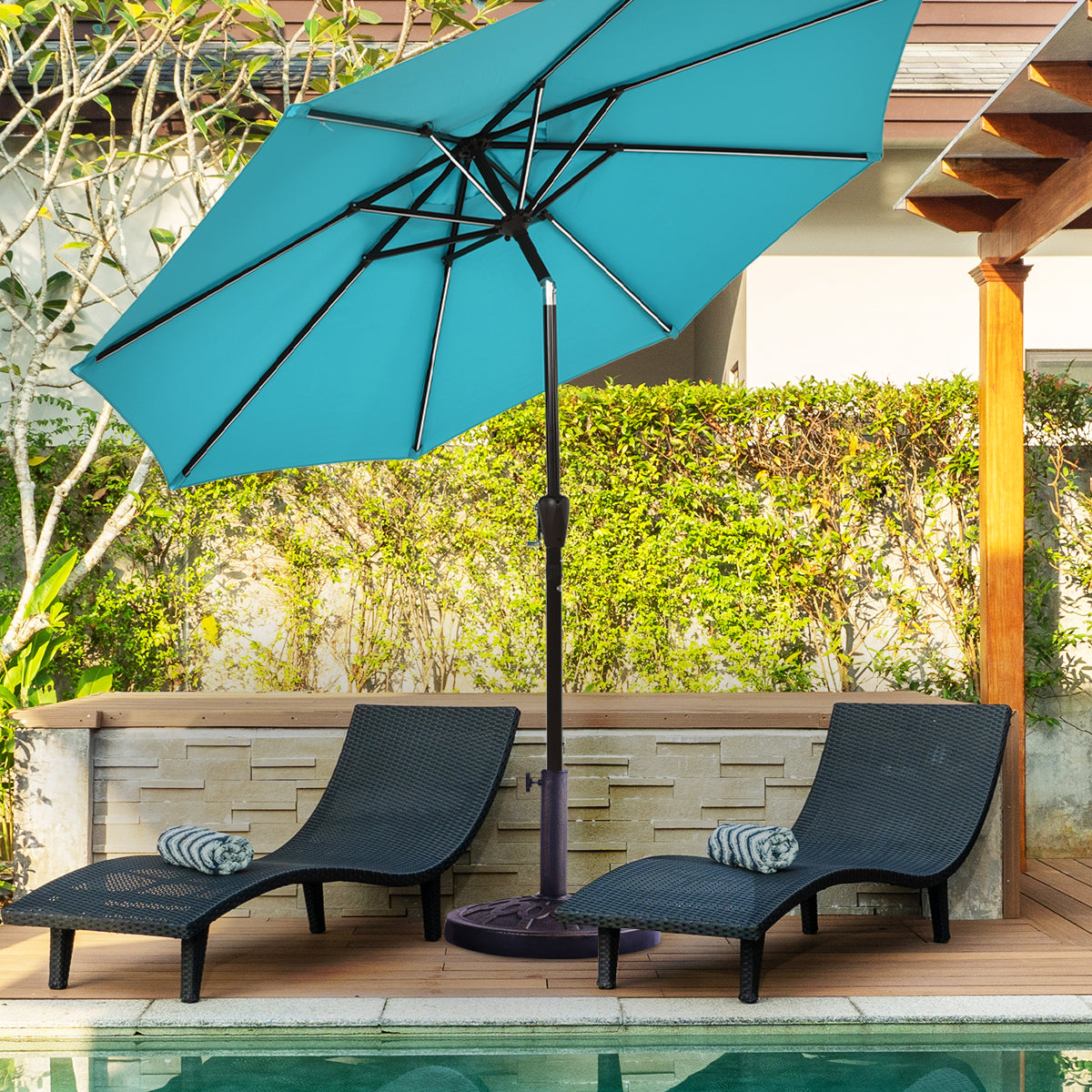 Large round umbrella stand helps hold umbrellas securely and evenly on outdoor surfaces