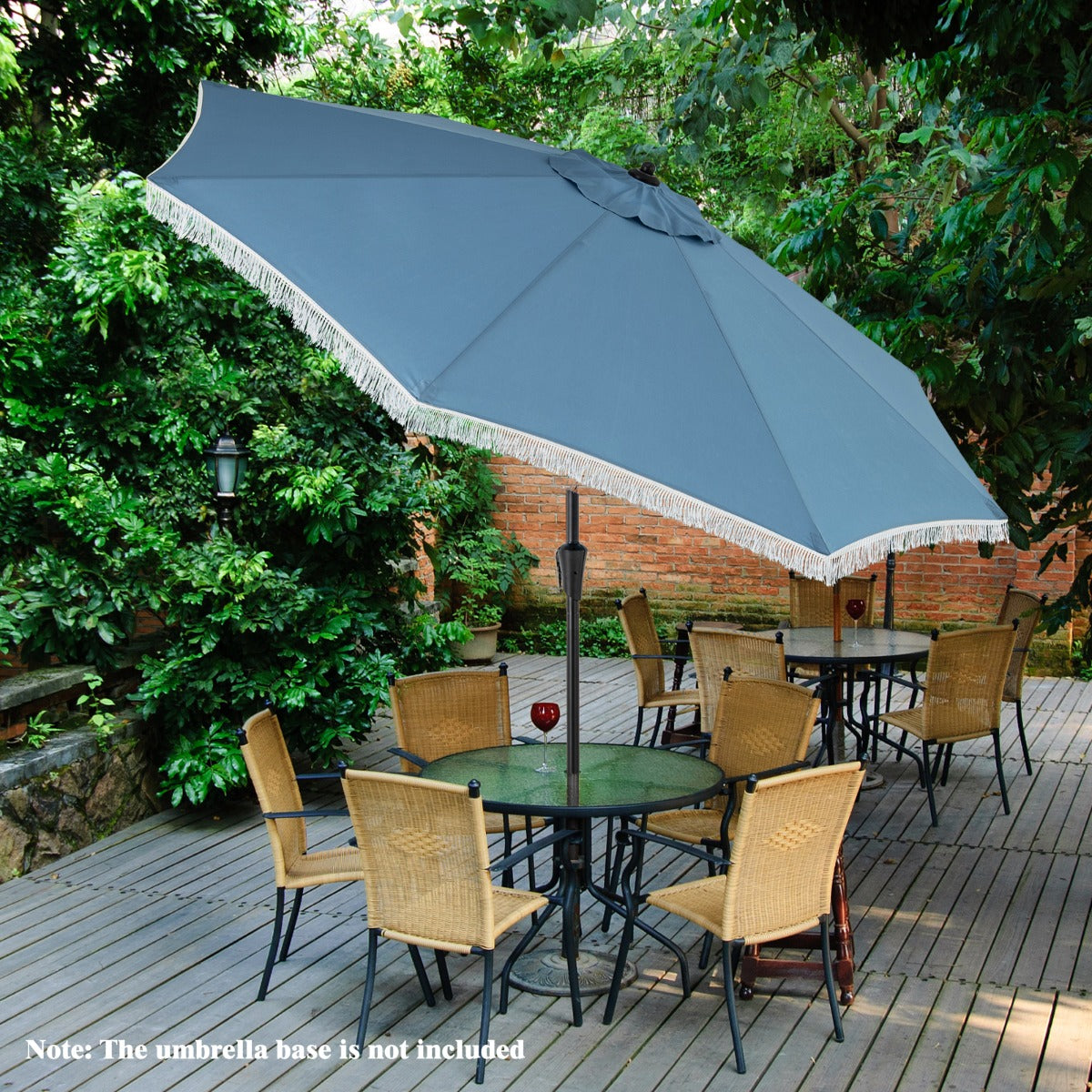 Decorative patio umbrella features reinforced rib pockets and fasteners for attaching accessories