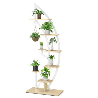 Anti-toppling mechanism mounts to the wall for improved safety and stability