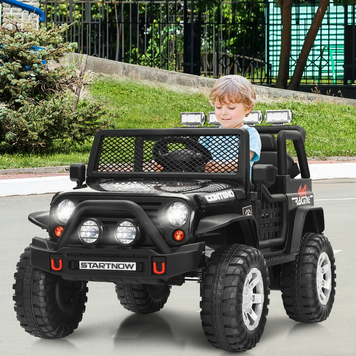 Kids electric car with 2.4G parental remote control that overrides pedal and steering wheel operation