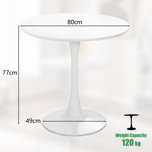 Modern white round dining table with a tulip pedestal design for stylish mid-century interiors