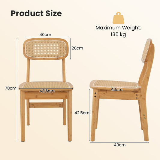 Set of two natural rattan dining chairs with woven seats, backrests, and solid bamboo frames